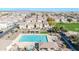 Aerial view of the community pool, clubhouse, and surrounding neighborhood at 4669 E Olney Ave, Gilbert, AZ 85234