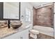 Well-appointed bathroom with a vessel sink and a tiled shower-over-tub at 4669 E Olney Ave, Gilbert, AZ 85234