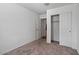 Cozy bedroom with neutral carpet, closet, and white walls at 618 E Elm Ln, Avondale, AZ 85323