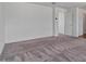 Spacious bedroom with neutral carpet and crisp white walls at 618 E Elm Ln, Avondale, AZ 85323