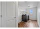 Clean laundry room with modern washer and dryer and storage shelving at 618 E Elm Ln, Avondale, AZ 85323