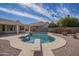 Private backyard featuring a diving board and a pool, perfect for relaxation and recreation at 630 W Madero Ave, Mesa, AZ 85210