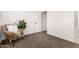 Bright bedroom featuring neutral carpet and a large window and white closet door at 645 N 97Th St, Mesa, AZ 85207