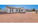 Spacious front yard with gravel landscaping leads to a newly painted home at 645 N 97Th St, Mesa, AZ 85207