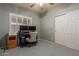 A spacious bedroom with closet and desk area for work or study at 6834 S Dennis Dr, Tempe, AZ 85283