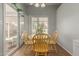 Bright breakfast nook with tiled floor and sliding glass door offers a cozy dining experience at 6834 S Dennis Dr, Tempe, AZ 85283