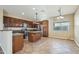 Well-appointed kitchen featuring stainless steel appliances, granite countertops, and ample cabinet space at 7355 W Red Hawk Dr, Peoria, AZ 85383