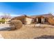 Beautiful home featuring a well-manicured yard with desert landscaping, and a tile roof at 8029 W Whyman Ave, Phoenix, AZ 85043