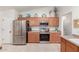 Well-lit kitchen featuring modern appliances, cabinets, and ample counter space at 8029 W Whyman Ave, Phoenix, AZ 85043