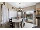 Bright dining area with pool view at 827 W Kesler Ln, Chandler, AZ 85225