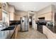 Updated kitchen with granite countertops and stainless steel appliances at 827 W Kesler Ln, Chandler, AZ 85225