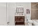 Full bathroom with a modern vanity, tiled shower, and coordinated fixtures at 8443 E Sheridan St, Scottsdale, AZ 85257