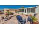 Charming backyard with patio, barbecue grill, and desert plants, perfect for outdoor enjoyment at 8500 E Southern Ave # 551, Mesa, AZ 85209