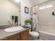 Cozy bathroom featuring a shower-tub combo with a patterned shower curtain and a neutral-toned vanity at 8500 E Southern Ave # 551, Mesa, AZ 85209