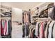 Walk-in closet with custom shelving and ample storage space for clothing and accessories at 9130 E Crystal Dr, Sun Lakes, AZ 85248