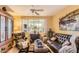 Cozy living room with leather furniture, decorative accents, and natural light at 9130 E Crystal Dr, Sun Lakes, AZ 85248