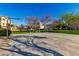 Community basketball court, with well-maintained landscaping and residential buildings in the background at 923 W Wendy Way, Gilbert, AZ 85233