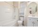 Clean bathroom featuring a shower-tub combination, sink, and white vanity at 923 W Wendy Way, Gilbert, AZ 85233