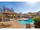 Community pool with a shaded gazebo, seating, and pristine blue water for residents to enjoy at 923 W Wendy Way, Gilbert, AZ 85233