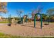 Community playground featuring slides, swings, and a rock-climbing structure on a sunny day at 923 W Wendy Way, Gilbert, AZ 85233