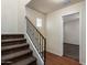 Carpeted staircase with railing leading to a second-story landing at 923 W Wendy Way, Gilbert, AZ 85233