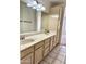 Bright bathroom with a dual sink vanity with plenty of storage at 9238 W Behrend Dr, Peoria, AZ 85382