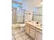 Well-lit bathroom with a shower and sink at 9238 W Behrend Dr, Peoria, AZ 85382