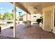 Relaxing covered patio with ceiling fans offers a perfect outdoor space for entertaining or unwinding at 9238 W Behrend Dr, Peoria, AZ 85382