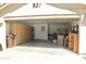 Spacious garage with built-in cabinets for optimal organization and storage at 9238 W Behrend Dr, Peoria, AZ 85382