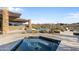 Beautiful outdoor pool area with views of the desert landscape at 9887 E Palo Brea Dr, Scottsdale, AZ 85262