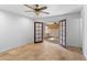 Bedroom with ceiling fan and french doors at 10611 N 9Th Dr, Phoenix, AZ 85029