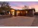 Charming home with desert landscaping, brick driveway, and a warm, inviting facade at 10611 N 9Th Dr, Phoenix, AZ 85029