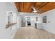 Bright kitchen with white cabinetry, stainless steel appliances, and a view of the open living space at 10611 N 9Th Dr, Phoenix, AZ 85029