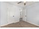 This bedroom leads to the bathroom with dual sinks and black accents at 1119 W Heather Ave, Gilbert, AZ 85233