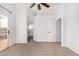 Bedroom featuring walk out to balcony, ensuite bath, and ceiling fan at 1119 W Heather Ave, Gilbert, AZ 85233