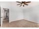 Bedroom with ensuite bath and access to additional rooms in the home at 1119 W Heather Ave, Gilbert, AZ 85233