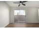 Living room with hardwood floors and sliding glass door that floods the space with natural light and provides outdoor access at 11210 N 109Th St, Scottsdale, AZ 85259