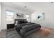 Comfortable main bedroom featuring a large bed, neutral walls, and stylish decor at 11620 W Marguerite Ave, Avondale, AZ 85323