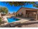 Beautiful backyard pool with a baja step and tanning ledge, great for outdoor living and entertaining at 12622 W Apodaca Dr, Litchfield Park, AZ 85340