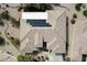 Aerial view of home showing tile roof and solar panels on roof at 16769 W Brookhaven Ct, Surprise, AZ 85387