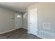 The entryway features gray paint and wood-look floors at 1715 E El Parque Dr, Tempe, AZ 85282