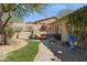 Backyard with a decorative stone path and a cozy seating area at 17366 E Via Del Oro St, Fountain Hills, AZ 85268