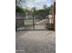 Gated backyard with stone landscaping at 17366 E Via Del Oro St, Fountain Hills, AZ 85268