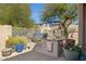 Outdoor grill area with granite countertops and decorative landscaping at 17366 E Via Del Oro St, Fountain Hills, AZ 85268