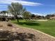 Lush green space with walking paths and mature trees, perfect for a relaxing stroll at 1893 S Sinova S Ave, Gilbert, AZ 85295