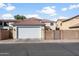 Two-car garage with automatic door provides secure parking and extra storage space at 1893 S Sinova S Ave, Gilbert, AZ 85295