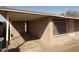 Features a covered carport providing shade and protection for vehicles at 1950 E Wier Ave, Phoenix, AZ 85040