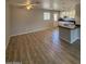 Spacious living area flowing into an open kitchen with bar-style seating at 1950 E Wier Ave, Phoenix, AZ 85040