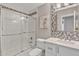 Bathroom with a combination shower and tub and mosaic tile accents at 20837 N 23Rd Pl, Phoenix, AZ 85024