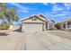 Attractive home with a driveway, two-car garage, and xeriscaped front yard for low maintenance at 20837 N 23Rd Pl, Phoenix, AZ 85024